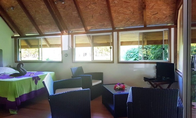 Teahupoo House | Discover Fare Ora: Nestled in a Serene Wooded Park
