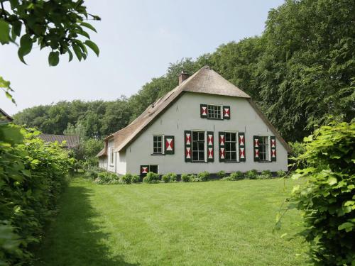 Municipality of Utrechtse Heuvelrug House | Serene Farmhouse Retreat in Doorn with Hot Tub & Fireplace
