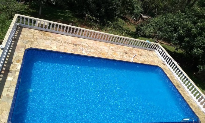 Suzano House | Inviting Farmhouse in Suzano with Pool and Cozy Fireplace