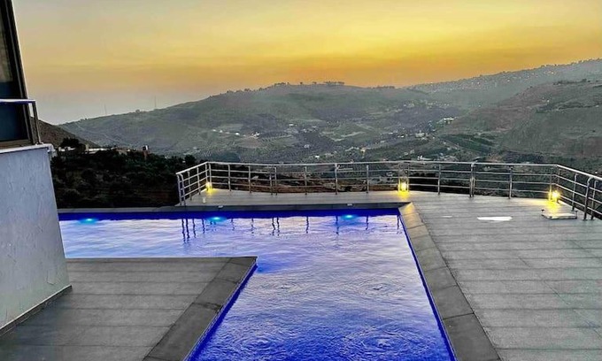 Suwailih Villa | Inviting Farmhouse Retreat with Pool and Oceanfront Views