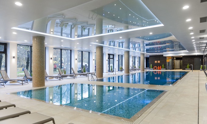 West Pomeranian Voivodeship Apartment | Faro Nadmorskie Tarasy SPA: Poolside Retreat by the Sea