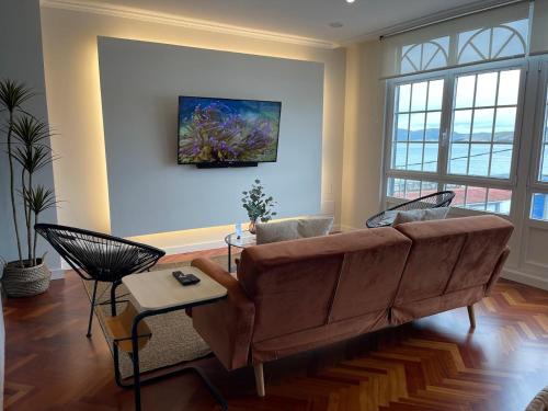 Laxe Apartment | Faro de Laxe: Oceanfront Retreat with 9.5/10 Guest Ratings