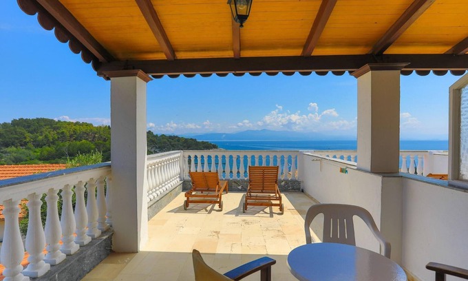 Gaios Apartment | Cozy Faros Tria in Gaios: Ideal for Families, Breakfast Included