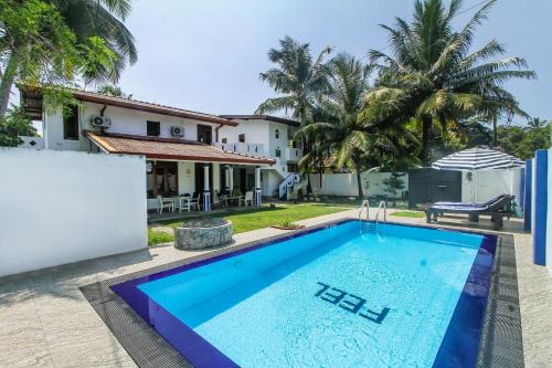 Kalutara House | Experience FEEL Villa: Oceanfront Retreat with Spa & Pool