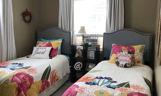 Harrisburg Condo | Picturesque Retreat with Hot Tub, Bikes & Lush Flowers