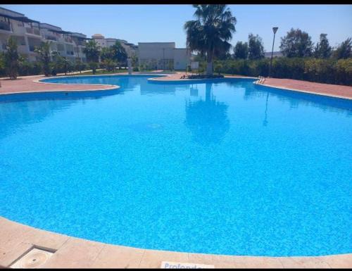Marina Apartment | Discover Fenêtre sur le paradis: Poolside Family Retreat