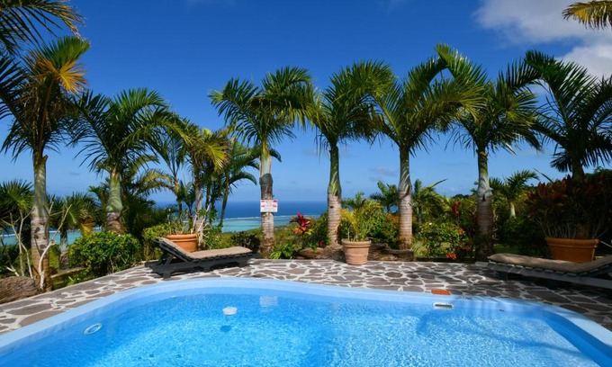 Grande Montagne House | Explore Fenetre sur Mer: Oceanfront Escape with Pool