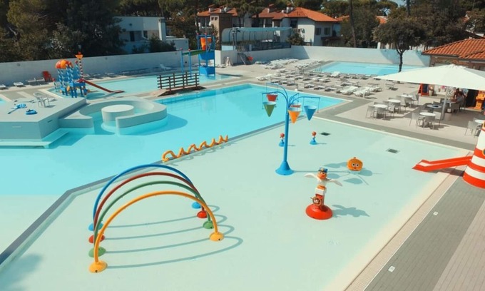Lido di Spina House | Feriendorf Mare Pineta: Ideal Spot for Families & Pets