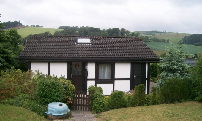 Feriendorf Hennesee House | Idyllic Holiday Home on Lake Henne with Pet-Friendly Terrace