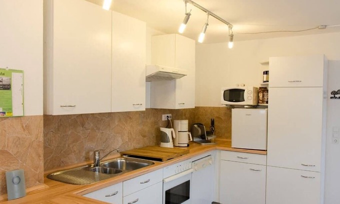 Barnau Apartment | Beautiful Two-Story Retreat with Private Balcony & Breakfast