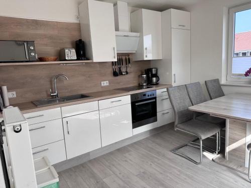 Norddeich Apartment | Oceanfront Ferienhaus Blütenzauber: Rated 9/10 by Guests