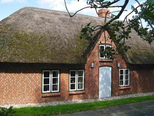 Westerhever House | Cozy Holiday Home in Westerhever with Fireplace & Garden