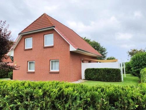 Dorumer Neufeld House | Oceanfront Retreat at Ferienhaus Villa Deichfürst