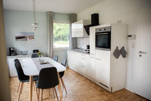 Leer House | Oceanfront Retreat at Ferienhuus 35 with Spa Amenities