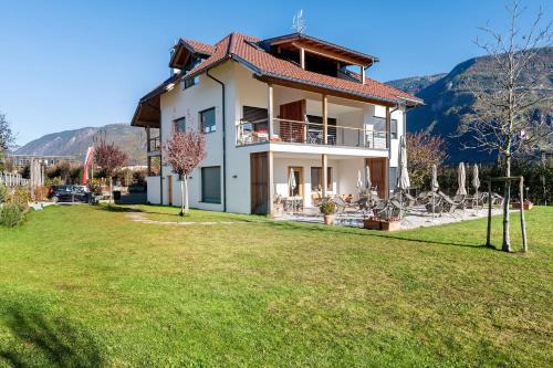 Andriano Apartment | Family-Friendly Retreat at Ferienwohnung 3 Weger - Rated 9/10