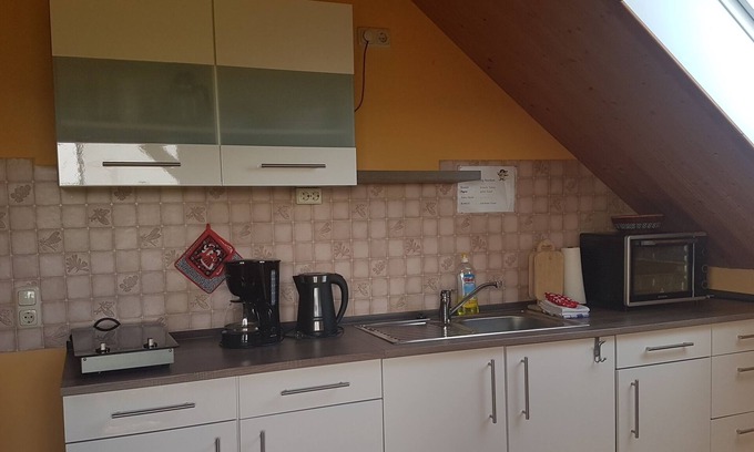 Gunzenhausen Apartment | Cozy Dachgeschoss Apartment with Balcony and Family Amenities