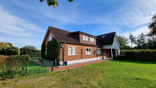 Kalifornien Apartment | Ferienwohnung "Achtern Diek 2" 1 Reihe an der Ostseeküste