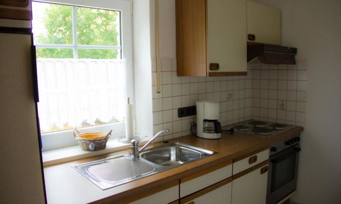 Ortsmitte Apartment | Cozy Ferienwohnung Braun with Kitchen for Your Getaway