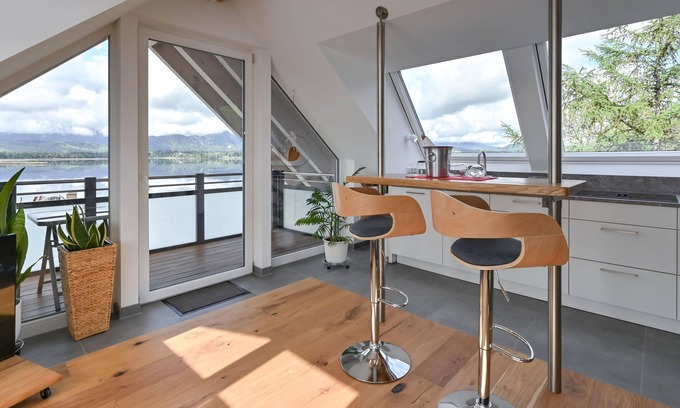 Hopfen am See Apartment | Relax at Ferienwohnung "carpe Diem" with Lake Views
