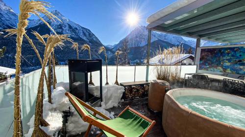 Engadin Scoul Apartment | Relaxing Retreat at Chasa Splerin with Terrace Hot Tub