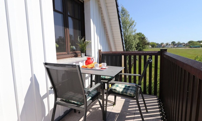 Ostseebad Prerow Apartment | Tranquil Retreat with Scenic Views and Family Amenities
