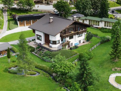 Berwang Apartment | Discover Ferienwohnungen Falger: Poolside Comfort Awaits