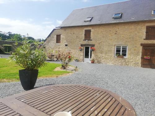 Asnieres-en-Bessin Bed & Breakfast | Oceanfront Retreat at Ferme de Montigny - Family Friendly Stay