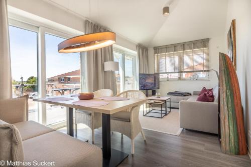 Wangerland Apartment | Oceanfront Comfort at Fewo Lachmööv Haus Norderney - 4 Star