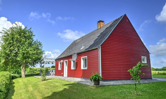 Husby House | Pet-Friendly Red House with Ocean View & Cozy Terrace
