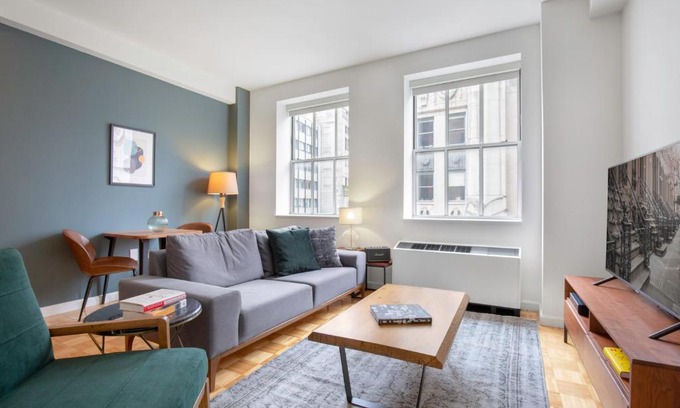Financial District Apartment | Modern 1BR FiDi Retreat with Gym & Golf Simulator
