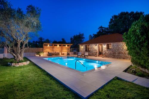 Pastida Villa | Experience Filerolia Stone House: Oceanfront with Pool