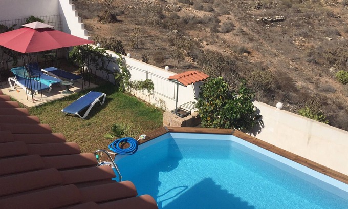 Buzanada Apartment | Cozy Finca Ardilla: Poolside Studio with Large Terrace