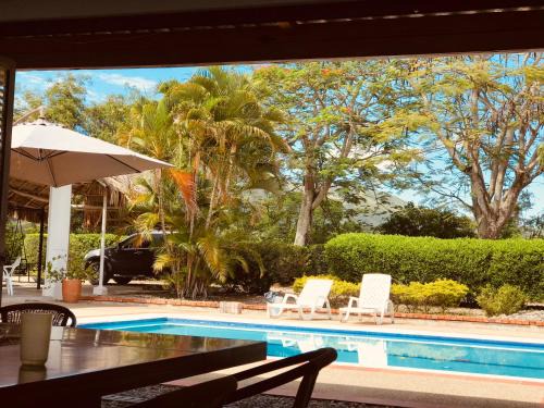Tocaima House | Relax at Finca Dan Pierre: Family-Friendly with Pool Access