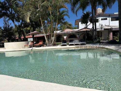 Atlixco Villa | Relax at Finca El Quijote: Poolside Retreat with Ocean Views