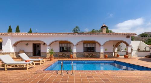 Canillas de Aceituno House | Discover Finca Los Almendral: Family-Friendly Retreat
