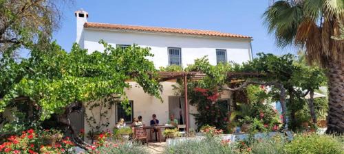 Olvera House | Idyllic Finca Los Meleros: Oceanfront Farmhouse Retreat