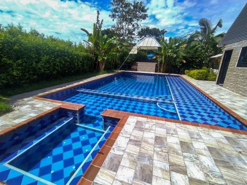 Guamal Villa | Experience Finca Los Tres Reyes: 4-Star Getaway with Pool