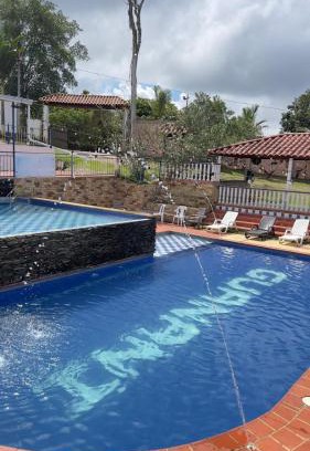 Socorro Cabin | Pet-Friendly Finca Vacacional Guanani with Ocean View Pool