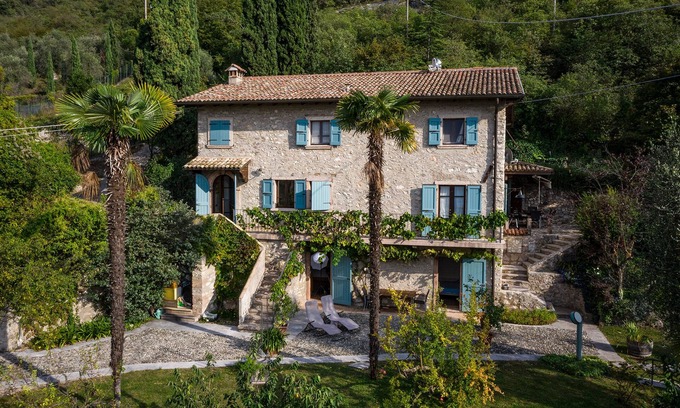 Malcesine Villa | Elegant Farmhouse Retreat with Oceanfront View & Garden