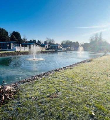 Allerthorpe House | Cozy Fir Tree Lodge with Hot Tub and Pet-Friendly Amenities