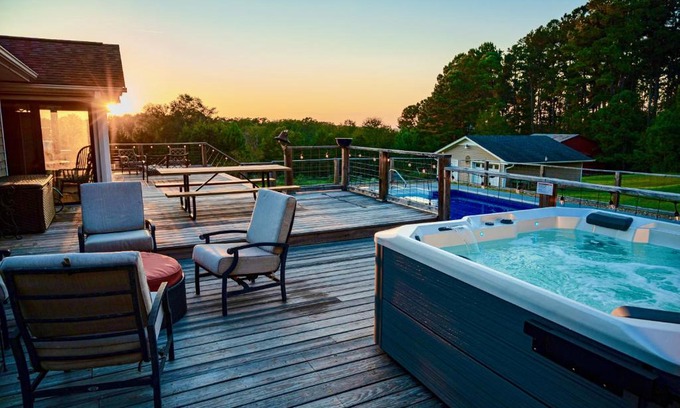 Easley House | Relax by the Fire Pit: Pool, Hot Tub & Fishing Fun