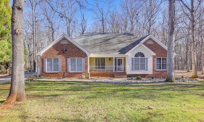 Dacula House | Fire Pit & Wooded Views: Family Home in Dacula!