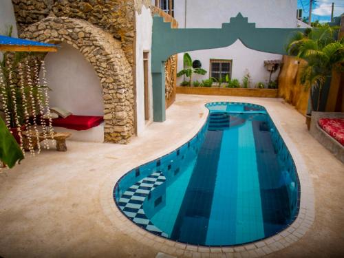 Bagamoyo Hotel | Family-Friendly Firefly West Wing with Pool and Dining