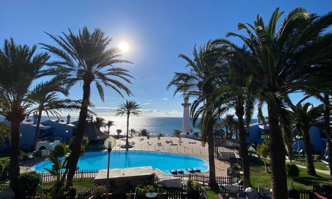 Playa del Aguila Apartment | Beachfront Maritime Deluxe Apartment with Balcony & Pool