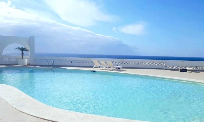 San Agustin Apartment | Elegant Oceanfront Apartment with Pool and Breakfast Included