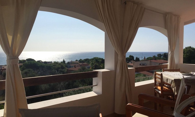 Sarroch Apartment | Oceanfront Apartment with Sea View Veranda in Porto Columbu