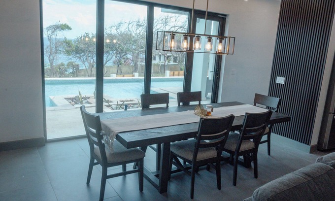 Turrets Condo | First Floor Oceanview Apartment Steps from Beach
