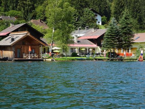 Feld am See Apartment | Relax at Fischerhof Appartements with Private Beach Access