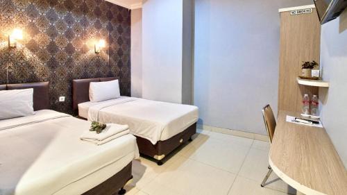 Gambir Hotel | Discover Flamenco Urban Stay: Family-Friendly Retreat