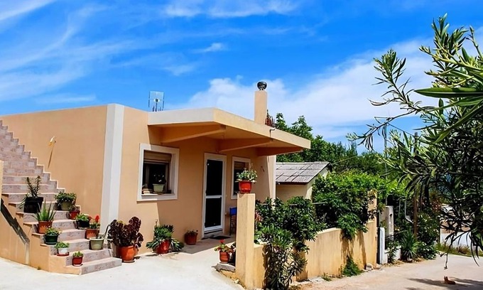 Poulata Apartment | Pet-Friendly Retreat: Flamiatos Garden Cottages, 4-Star Stay